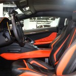 Оранжево-черный Lamborghini Aventador tuning / тюнинг Mansory фото интерьера